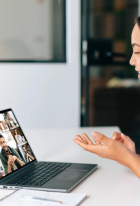 Online communication woman on a video call talking to remote workers